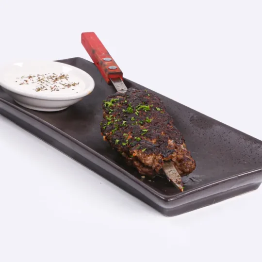 Chargrilled skewer Kofta served with Tzatziki